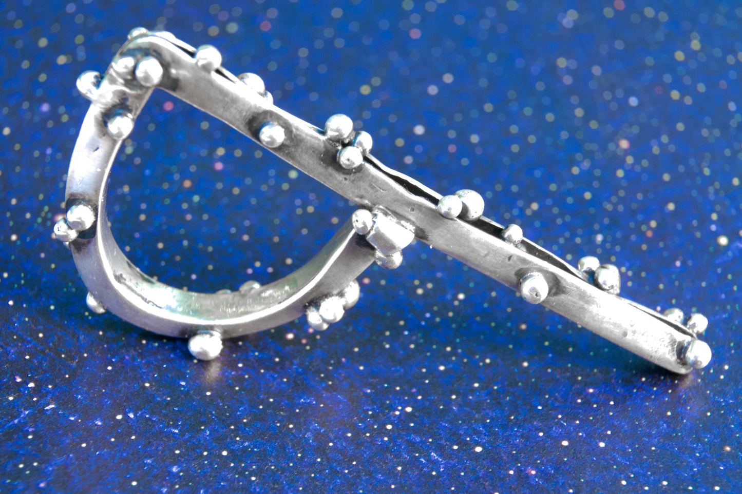 Comet Ring.